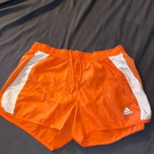 Orange Addis’s shorts